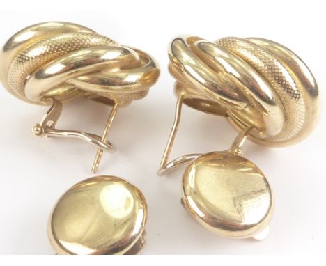 Pair of 9ct gold ear clips of whorl form and a pair of button ear clips. Condition Report. 15g.