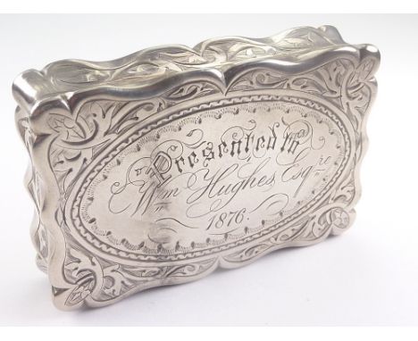 Silver snuff box with shaped waisted sides, engraved all over with presentation 1876, by F Marston Birmingham 1873. 67mm x 46