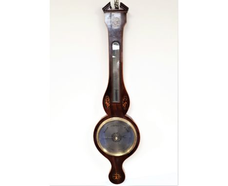 Georgian mahogany wheel barometer with silvered scale inlaid with shells.