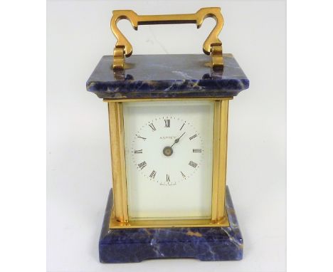 Miniature carriage clock for Asprey in corniche style case with Swiss lapis top and base. 8.5cm.