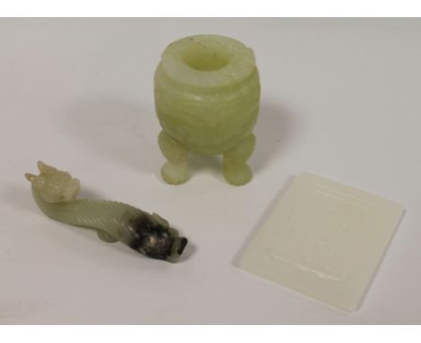 Chinese celadon jade belt hook, 8.5cm long, a miniature tripod censer,7.5cm high and a white jade rectangular dragon plaque, 
