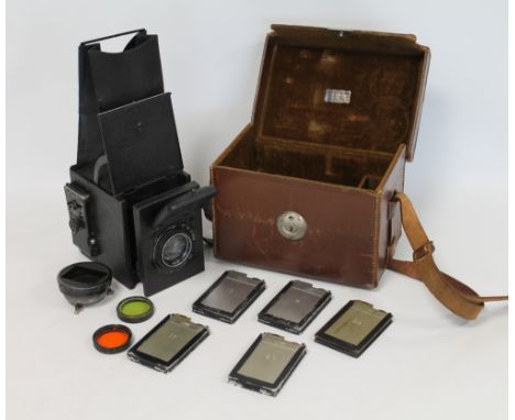 Dallmeyer Baby Speed Reflex camera with Dallmeyer Pentac f2.9/4 lens, No.134788, with six slides to fit 4.5cm x 6cm plates, l