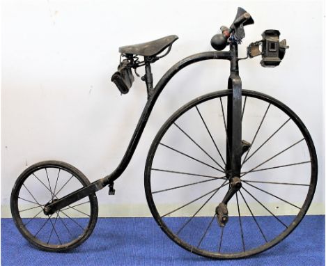 Child's penny farthing bicycle with Dunlop seat, carbide lamp and saddlebag,