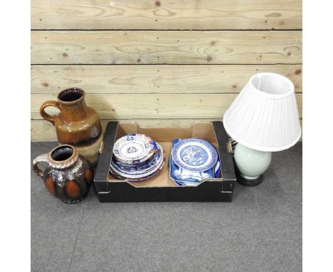 A pottery table lamp, with shade, 54cm high overall, together with plates and two brown glazed vases