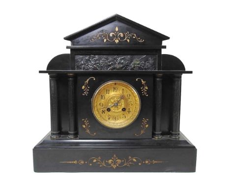 A Victorian black slate mantle clock, with a brass dial, 38cm high