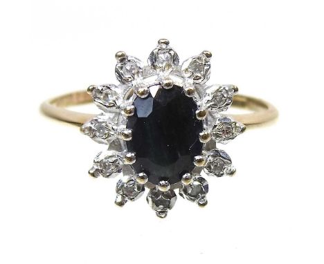 A 9 carat gold sapphire and diamond cluster ring, 2.4g, size Q, boxedInsurance valuation line 8