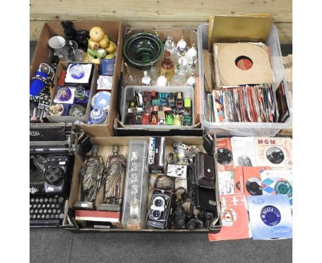 A collection of items, to include records, a typewriter, cameras and ornaments