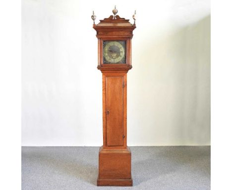 An 18th century oak cased longcase clock, with an eleven inch brass dial, signed W. Flint Charing and thirty hour movement, 2