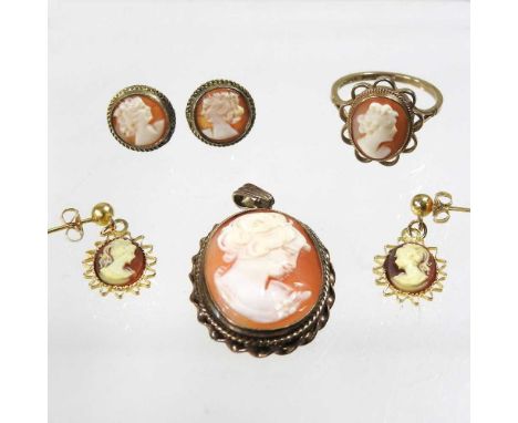 A 9 carat gold ring, mounted with a cameo, 2.8g, size O, together with two pairs of cameo earrings and a pendant (4)