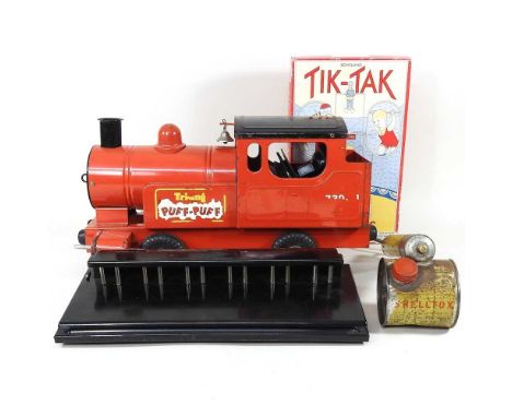 A Triang Puff-Puff children's model train, 46cm long, together with a bakelite railway ticket machine, a Shell insect sprayer