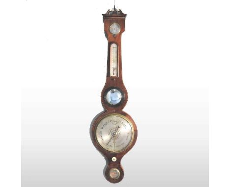 A 19th century mahogany cased wheel barometer, with a silvered dial, signed Johnson, High Wycombe, 96cm high. Note: a non-tra