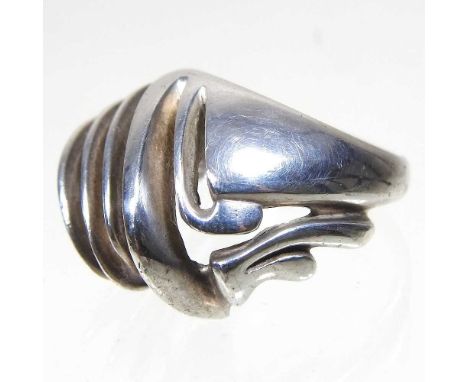 A Georg Jensen silver ring, of modernist design, size M, 14.4gOverall condition is complete. Has been worn, so has various li