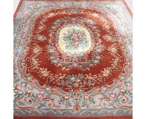 A large Chinese woollen carpet, decorated with coloured flowers, 280 x 380cmSome light marks, but no visible damage