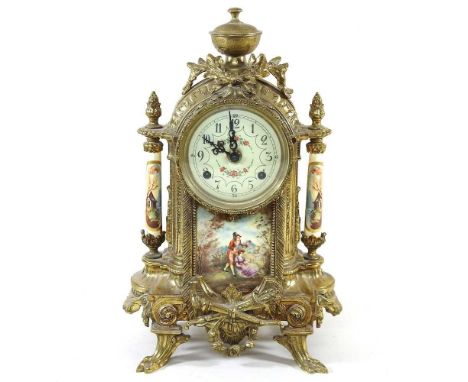 An ornate French style brass cased mantel clock, 35cm high