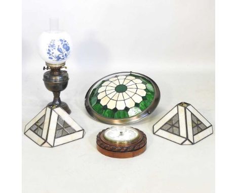 An oil lamp, together with an aneroid barometer and three Tiffany style lamps (4)