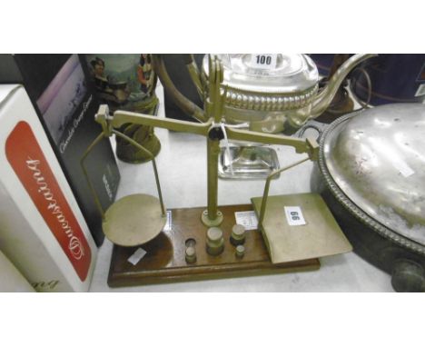 A SET OF SCALES AND WEIGHTS
