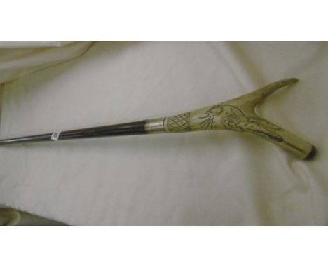 A BONE HANDLED SILVER COLLARD WALKING STICK