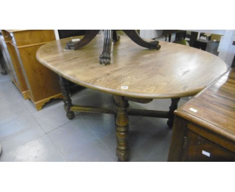 AN ERCOL DINING TABLE