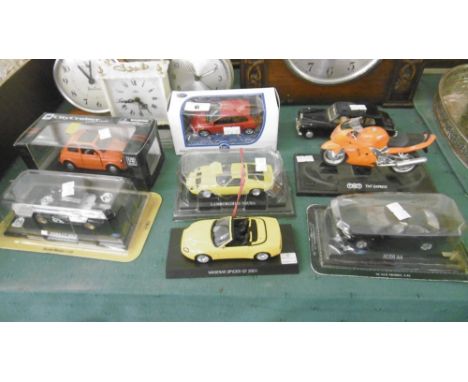 A SMALL QUANTITY OF MODEL CARS