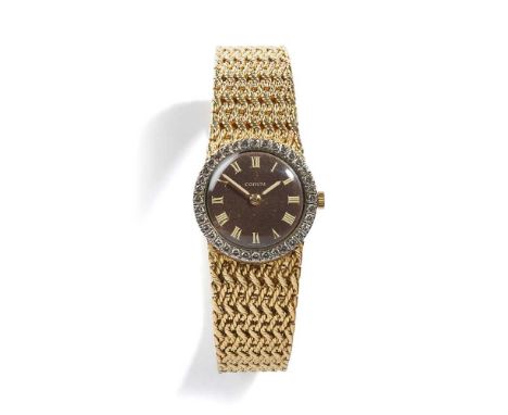 1970s, manual wind movement, signed round brown dial with Corum logo and Roman numerals, buff-coloured sword hands, full diam