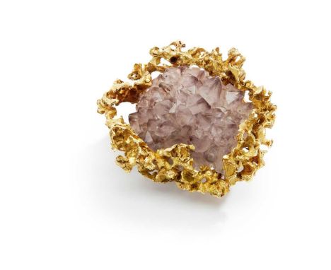 The large amethyst crystal geode within an 18ct gold frame of abstract design, signed B&amp;B, UK hallmarkLength: 5.4cm