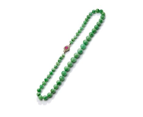 Composed of a single strand of graduated jadeite jade beads, the clasp collet-set with a cabochon ruby within an old-cut diam