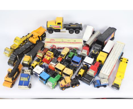 Tonka - Clover - 25 x small scale pressed steel Tonka and similar trucks including one Tiny-Tonka Fire Truck which still has 