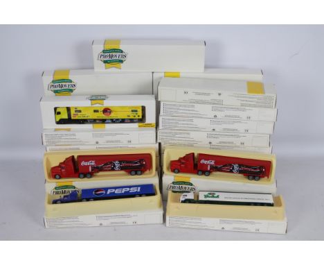 Lledo - A boxed collection of 27 Lledo 'Promovers' 1:76 scale diecast model trucks. Lot includes Lledo PM118 Kenworth T600A '
