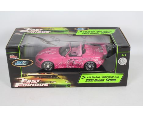 Racing Champions / Ertl - A boxed 1:18 scale 'Fast &amp; Furious' diecast 2000 Honda s2000. Model appears Mint in Fair plus -