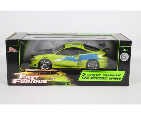 Racing Champions / Ertl - A boxed 1:18 scale 'Fast &amp; Furious' diecast 1995 Mitsubishi Eclipse. Model appears Mint in Good