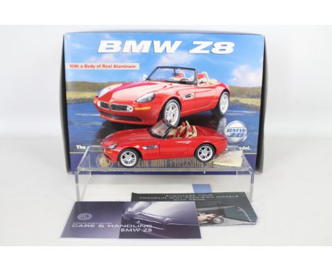 Franklin Mint - A boxed 1:24 scale BMW Z8 by Franklin Mint. The model in red appears to be in Very Good - Excellent condition