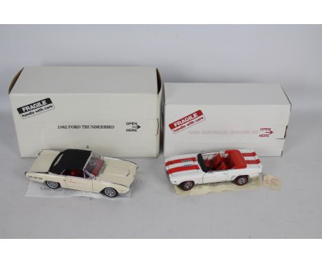 Danbury Mint - Two boxed Danbury Mint diecast 1:24 scale model cars. Lot includes 1962 Ford Thunderbird - the model in white 