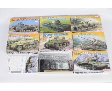 Dragon - Seven boxed 1:72 scale plastic military vehicle model kits by Dragon. Lot includes #7273 Armor Pro M4A1 Sherman Norm