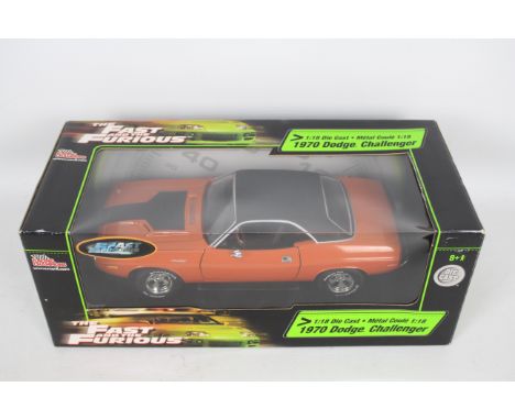Racing Champions / Ertl - A boxed 1:18 scale 'Fast &amp; Furious' diecast 1970 Dodge Challenger. Model appears Mint in Good o