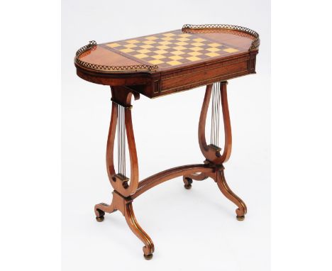 A 19TH C, REGENCY STYLE, BRASS INLAID ROSEWOOD GAMES TABLE with galleried bowed ends, reversible chess top and backgammon boa