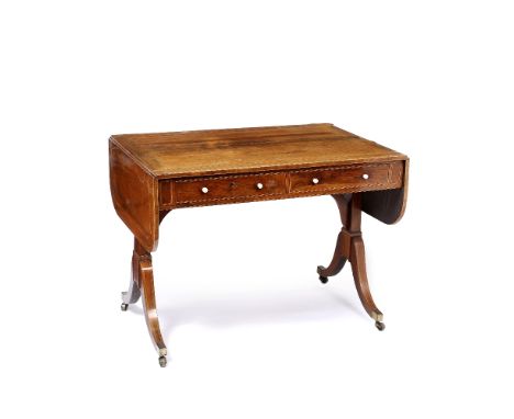 A REGENCY ROSEWOOD SOFA TABLE with crossbanded and line inlay drop leaf top and fitted two drawers with ivory knobs, on end s