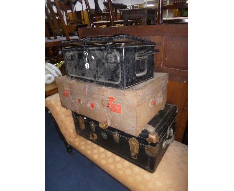 A VINTAGE TRAVELLING TRUNK, hide covered suitcase and a metal ammo crate (3)