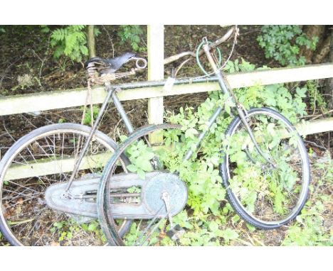 A VINTAGE RALEIGH 'THE ALL STEEL BICYCLE'