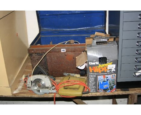 A TIN TRUNK, containing hand tools, a Black and Decker circular saw, jigsaw and a Clarke Junior Hylo submersible pump