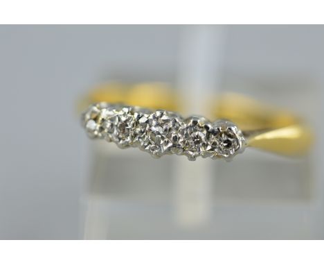 A MID-20TH CENTURY FIVE STONE DIAMOND HALF HOOP RING, estimated diamond weight 0.10ct, ring size M, stamped '18ct plat', appr