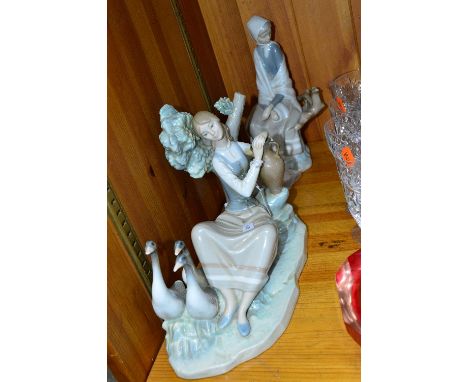 A LARGE LLADRO FIGURE GROUP, girl resting with geese and another Lladro figure of seated girl with bird (bird is loose) (2)