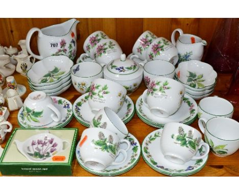 A ROYAL WORCESTER 'WORCESTER HERBS' PATTERN TEASET, to include cups, saucers, bowls and sugar bowl etc (over 35 pieces)