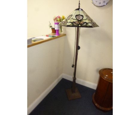 A TIFFANY STYLE HEXAGONAL SHADE STANDARD LAMP, on a square base, approximate height 166cm
