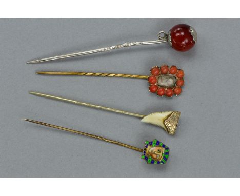 A COLLECTION OF STICK PINS, to include a late Victorian coral mourning pin, featuring a plaited hair section, engraved to bac