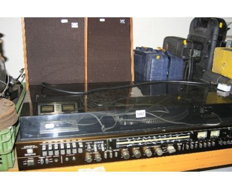 A VINTAGE CROWN MUSIC CENTRE, and a pair of Wharfedale speakers (3)