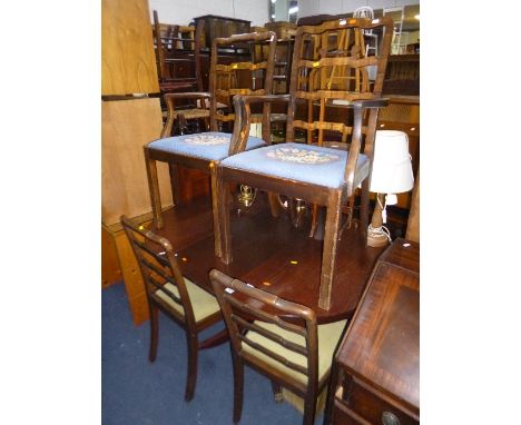 FOUR EDWARDIAN MAHOGANY LADDER BACK CHAIRS, including two carvers, together with a modern pedestal table (5)