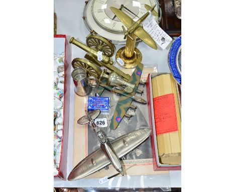 A NOVELTY TABLE LIGHTER SHAPED AS A SPITFIRE (with a box), together with brass model of a spitfire, a Corgi model and other s