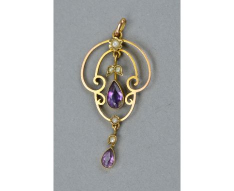 AN EARLY 20TH CENTURY AMETHYST AND SPLIT PEARL SCROLL DESIGN PENDANT, foliate scroll decoration, measuring approximately 50mm