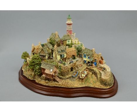 A BOXED LIMITED EDITION LILLIPUT LANE SCULPTURE, 'Out of the Storm' No.194/3000, certificate and leaflet