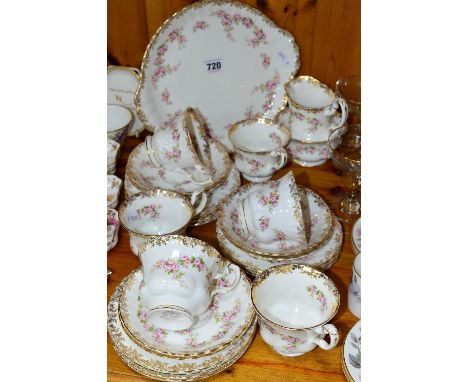 ROYAL ALBERT 'DIMITY ROSE' TEASET, to include cake plate (seconds), milk jug, sugar bowl, six cups (one hairline), six saucer